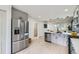 Contemporary kitchen with stainless steel appliances, sleek cabinets, and an open layout at 5721 W 92Nd Ave # 96, Westminster, CO 80031