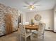 Inviting dining room boasts a round table, stylish lighting, and attractive wall accents at 21258 E Aberdeen Pl, Centennial, CO 80015