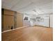 Spacious kitchen featuring white appliances, ample countertop space, and hardwood floors leading to a living area at 21258 E Aberdeen Pl, Centennial, CO 80015