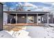 Covered patio with wood decking and a grill at 3088 S Grape Way, Denver, CO 80222