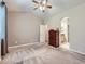 Spacious main bedroom with neutral carpeting, vaulted ceiling and an ensuite bathroom at 13385 Jasmine St, Thornton, CO 80602