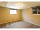 This bedroom boasts neutral colors, a large window, and plush carpeting, creating a serene and comfortable atmosphere at 5063 W 61St Ave, Arvada, CO 80003