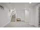 Finished basement with carpet flooring, stairs and painted white walls at 652 N Gilpin St, Denver, CO 80218