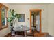 Cozy dining area with a wood table, hardwood floors, and lots of natural light at 652 N Gilpin St, Denver, CO 80218