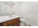 Bathroom featuring a vanity with modern sink and fixtures at 3401 N Denali St, Aurora, CO 80019