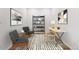 Bright and modern home office with sleek desk, cozy chairs, and minimalist decor at 3401 N Denali St, Aurora, CO 80019