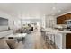 Bright and airy living space with open floor plan and modern fixtures at 3401 N Denali St, Aurora, CO 80019