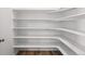 Well-organized pantry with multiple shelves and a wood floor at 3401 N Denali St, Aurora, CO 80019