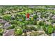 Wide aerial view of home showcasing its lush surroundings, mature trees, and overall neighborhood at 14118 Whitney Cir, Broomfield, CO 80023