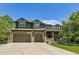 Charming two-story home with a three-car garage and a beautifully landscaped front yard at 14118 Whitney Cir, Broomfield, CO 80023