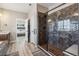 Elegant bathroom boasts dual sinks, soaking tub, and a stylish tiled shower at 16075 E 109Th Pl, Commerce City, CO 80022