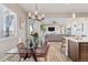 Dining area offering an open-concept layout to the kitchen and living area, ideal for entertaining at 16075 E 109Th Pl, Commerce City, CO 80022