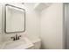 Bathroom includes modern fixtures, a stone countertop, and neutral tile at 7691 Osage St, Denver, CO 80221