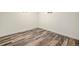 Bedroom with modern wood floors and neutral paint at 7691 Osage St, Denver, CO 80221