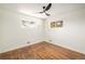 An empty bedroom with a wood floor at 7691 Osage St, Denver, CO 80221