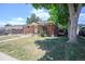 Charming brick home with covered porch and well-maintained lawn at 7691 Osage St, Denver, CO 80221
