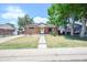 Charming brick home with well-maintained lawn at 7691 Osage St, Denver, CO 80221