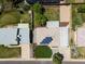 Overhead shot of home with solar panels, a well manicured lawn, and fenced backyard at 8641 Rutgers St, Westminster, CO 80031