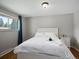 Cozy bedroom featuring a large window and a comfortable queen-size bed at 8641 Rutgers St, Westminster, CO 80031