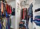 Organized walk-in closet filled with clothes, shoes, and storage accessories at 8641 Rutgers St, Westminster, CO 80031