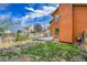 The backyard has a new patio and access to the second story balcony at 13028 Garfield Dr, Thornton, CO 80241