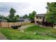 Expansive backyard featuring well-maintained grass and a wood fence surrounding the property at 9766 Fillmore St, Thornton, CO 80229