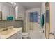 A well-lit bathroom with a shower and tub combination at 9766 Fillmore St, Thornton, CO 80229