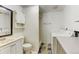 Bright bathroom featuring a shower and sink at 9766 Fillmore St, Thornton, CO 80229
