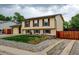 Exterior view of a two story home featuring a manicured front lawn and gravel landscaping at 9766 Fillmore St, Thornton, CO 80229
