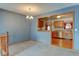 Living room featuring view into the kitchen at 9766 Fillmore St, Thornton, CO 80229