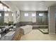 The bathroom includes a soaking tub, glass shower, dual vanity, and modern fixtures at 4585 Mesa Top Dr, Monument, CO 80132