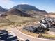 This aerial shot shows the beautiful homes in their community with views of the mountains at 4585 Mesa Top Dr, Monument, CO 80132