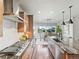 Spacious kitchen features granite countertops, stainless steel appliances, and an adjacent dining area at 4585 Mesa Top Dr, Monument, CO 80132