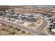 This aerial image showcases the layout of the neighborhood with its open spaces and many homes at 4585 Mesa Top Dr, Monument, CO 80132