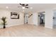 Open-concept living space boasting recessed lighting, neutral walls, and easy access to the kitchen and bathroom at 12172 Melody Dr # 102, Denver, CO 80234