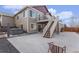 Backyard with patio, upper deck, stairs, and hot tub, perfect for outdoor relaxation and entertaining at 6817 Sequoia St, Frederick, CO 80530