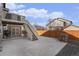 Backyard features a patio area with stairs to the upper deck, creating an ideal outdoor space at 6817 Sequoia St, Frederick, CO 80530