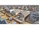 Spacious backyard with wooden fence, concrete patio, and deck featuring an access staircase, perfect for outdoor gatherings at 6817 Sequoia St, Frederick, CO 80530