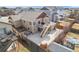 Beautiful backyard with a cozy hot tub, extended patio, and deck featuring access stairs for outdoor relaxation and entertainment at 6817 Sequoia St, Frederick, CO 80530