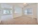 Spacious, open room offering ample natural light and neutral tones, perfect for flexible living arrangements at 4414 Walden St, Denver, CO 80249