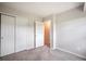 Neutral bedroom with a closet and doorway leading to the rest of the home at 404 Raspberry Ln, Monument, CO 80132