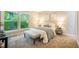 Bright bedroom with a large window offering outdoor views, a comfortable bed, and stylish decor at 404 Raspberry Ln, Monument, CO 80132