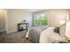 Inviting bedroom with scenic outdoor view and warm lighting and cozy furnishings at 404 Raspberry Ln, Monument, CO 80132