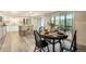 Charming dining area adjacent to an updated kitchen with stainless steel appliances at 404 Raspberry Ln, Monument, CO 80132