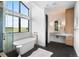 Bright bathroom featuring a freestanding tub, glass shower, and vanity with marble countertop at 5815 Peppy San Cir, Sedalia, CO 80135