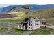 Exceptional hillside home with a walkout basement, stunning view, and a relaxing deck at 5815 Peppy San Cir, Sedalia, CO 80135