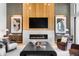 Beautiful living room with elegant decor, fireplace, and hardwood floors at 5815 Peppy San Cir, Sedalia, CO 80135