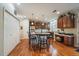 Spacious kitchen with a center island, stainless steel appliances, and ample cabinet space for storage and meal prep at 12856 King St, Broomfield, CO 80020