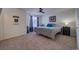 Main bedroom with ceiling fan and large windows at 4443 E Bennington Ave, Castle Rock, CO 80104