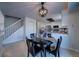 Dining area with a round table and four chairs, adjacent to the kitchen at 4443 E Bennington Ave, Castle Rock, CO 80104